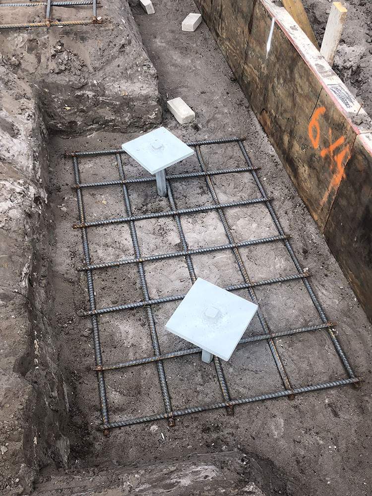 Picture of foundation for home being put